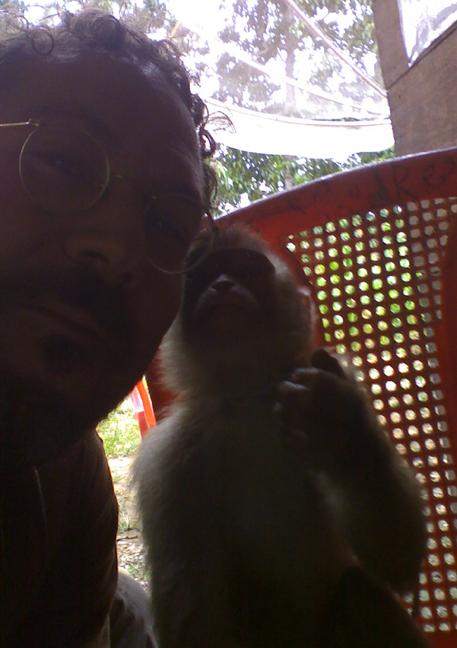 picture of Wade Schuman and the Pig Tailed Macaque in Indonesia